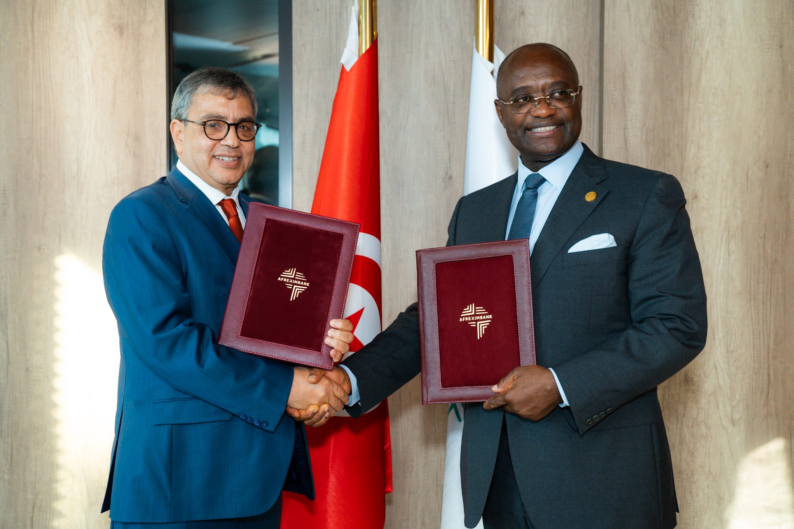 Dr Fethi Zouhaier Nouri of Tunisia's Central Bank, left, and Dr George Elombi of Afreximbank at the USD 500 million loan signing in Cairo in June 2026. Photo: Afreximbank.