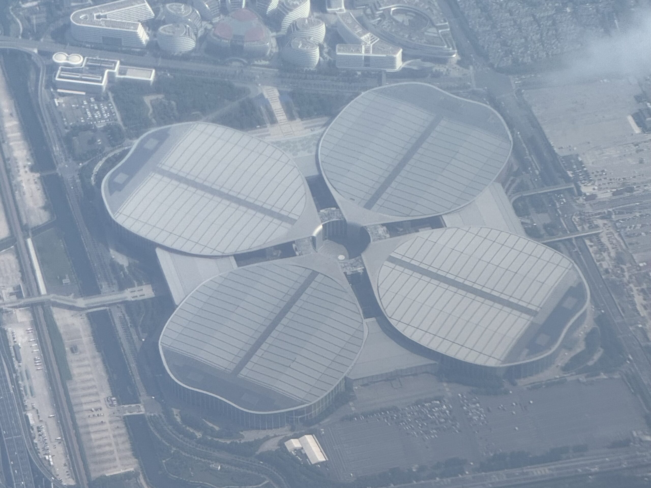 An aerial view of the National Exhibition and Convention Centre in Shanghai, photographed on 17 August 2026. Photograph by SSYoung, CC BY-SA 4.0.
