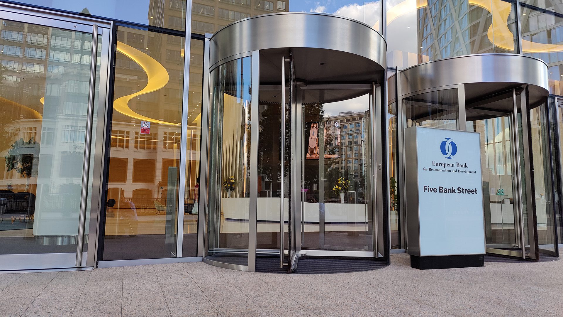Entrance to EBRD headquarters at Five Bank Street in London; official institutional file photograph.