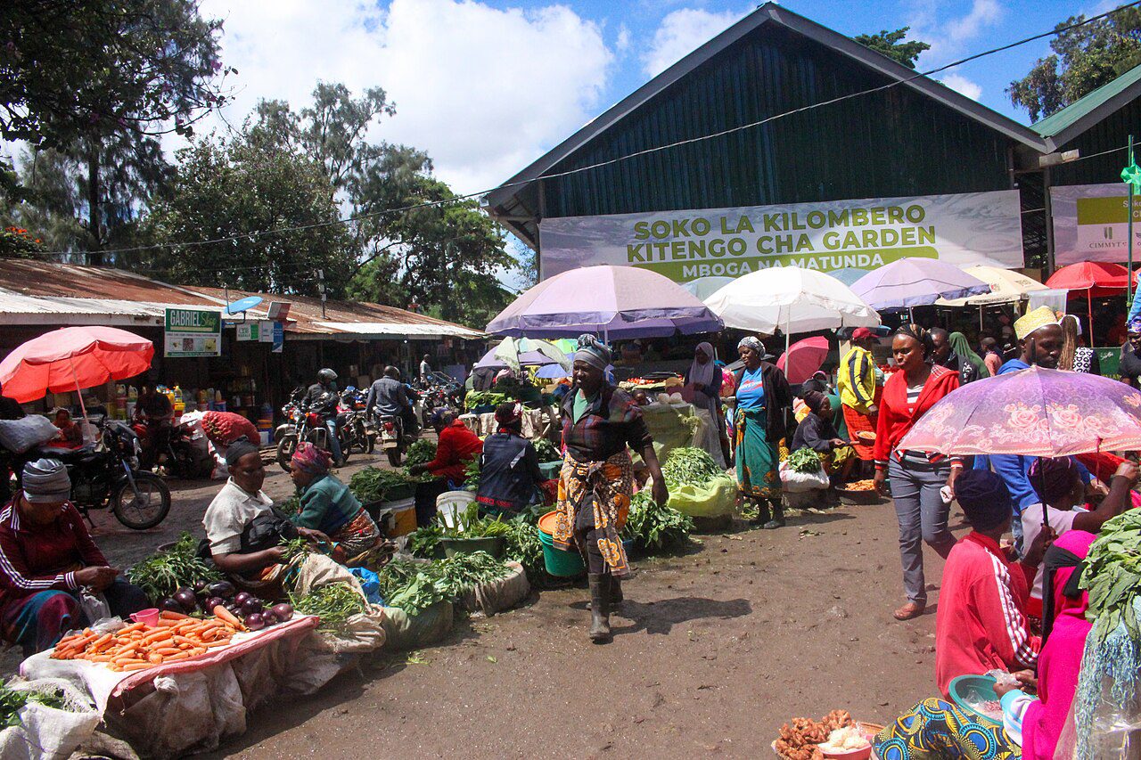 Vendors and shoppers in the vegetable section of Kilombero Market in Arusha, Tanzania; illustrative file photograph with capture date unconfirmed.